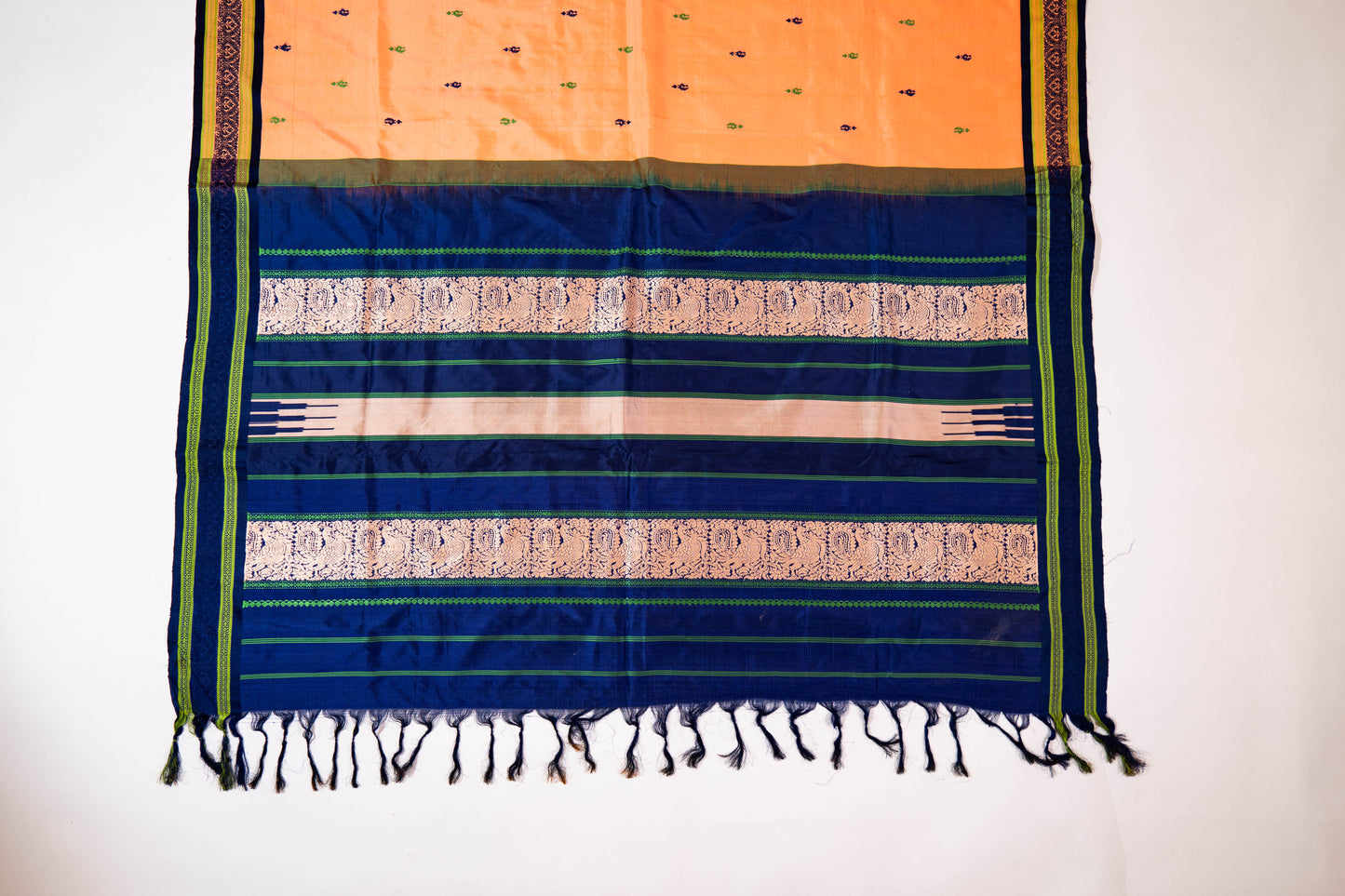Naagchampa~ Peach Pure Silk Dharmavaram Saree with Navy Blue Borders – A Regal Weave from Andhra Pradesh