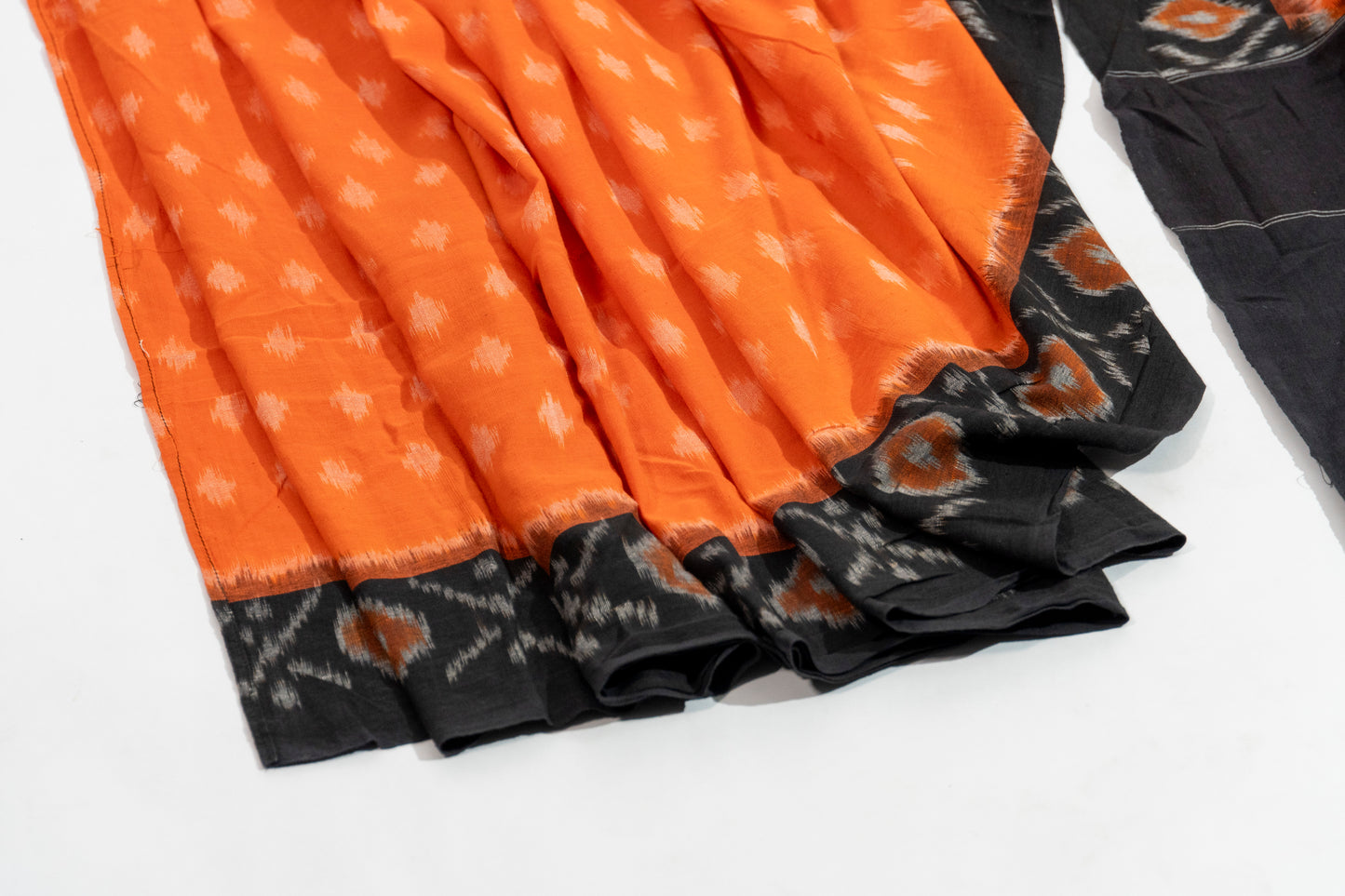 Sumitra - Vermillion Black Cotton Pochampally Saree