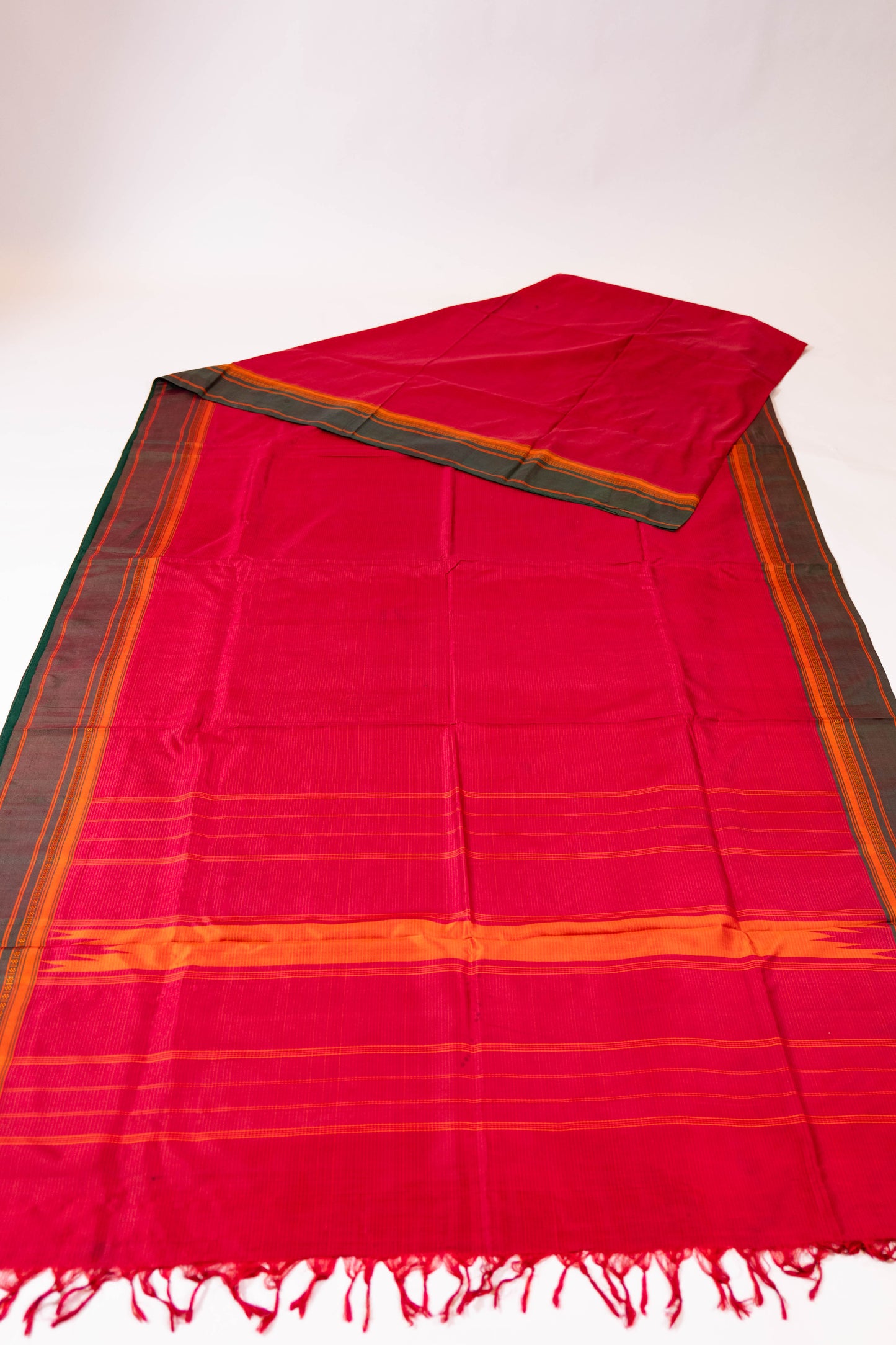Gulasharfi~ Maroon Arani Silk Saree with Green Borders & Thazampoo Palla – A Jewel from Tamil Nadu’s Looms