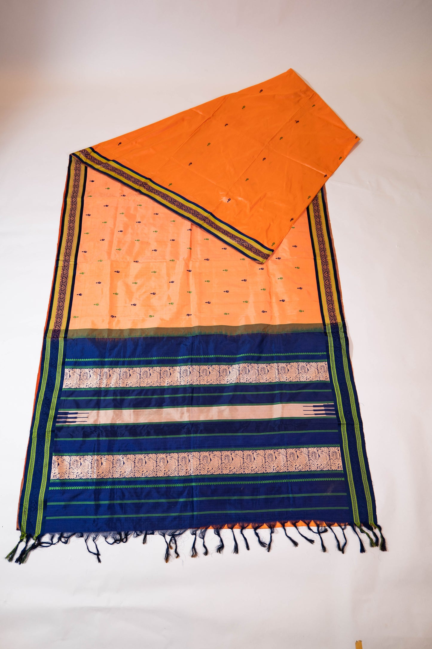 Naagchampa~ Peach Pure Silk Dharmavaram Saree with Navy Blue Borders – A Regal Weave from Andhra Pradesh