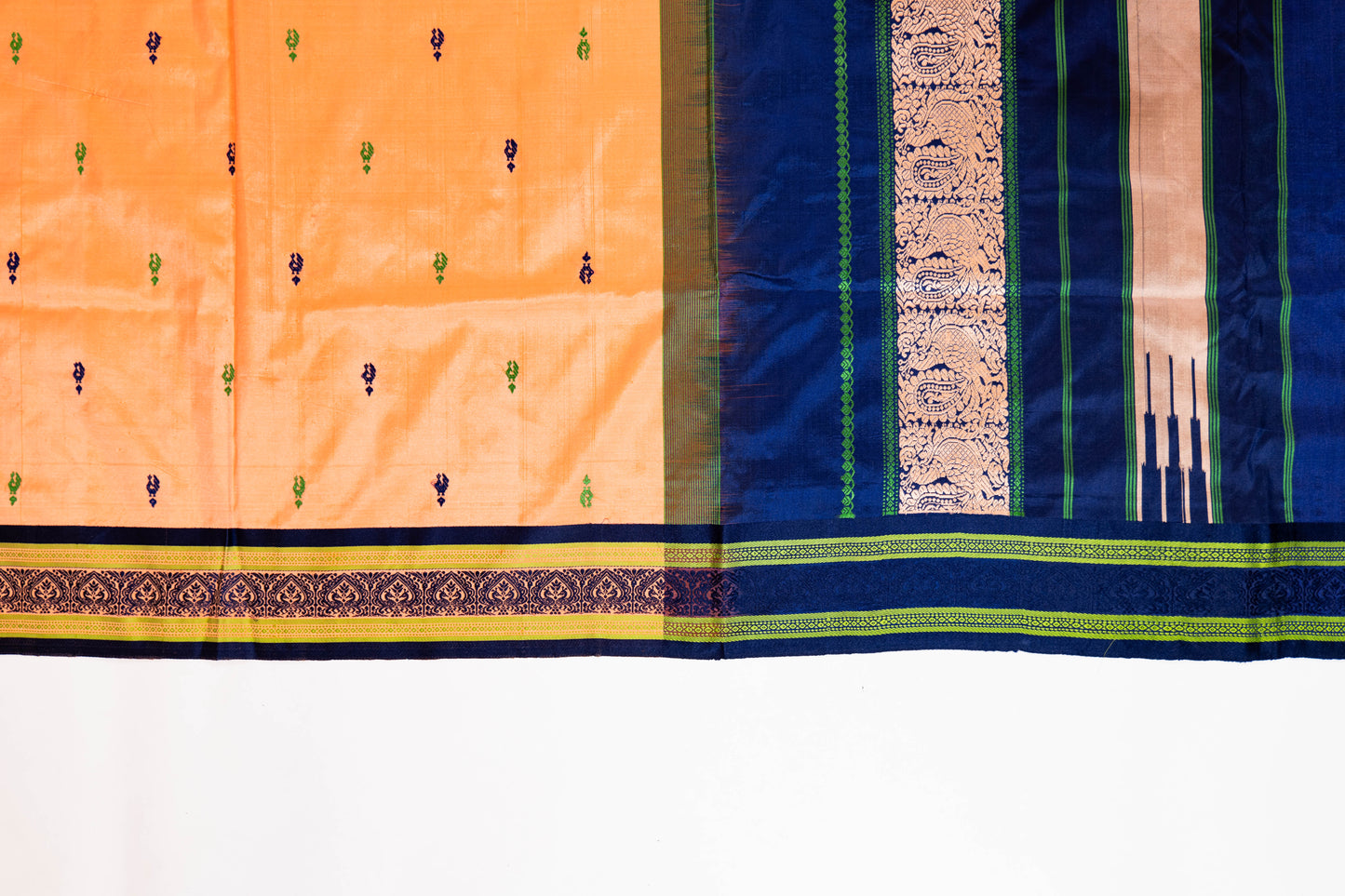 Naagchampa~ Peach Pure Silk Dharmavaram Saree with Navy Blue Borders – A Regal Weave from Andhra Pradesh