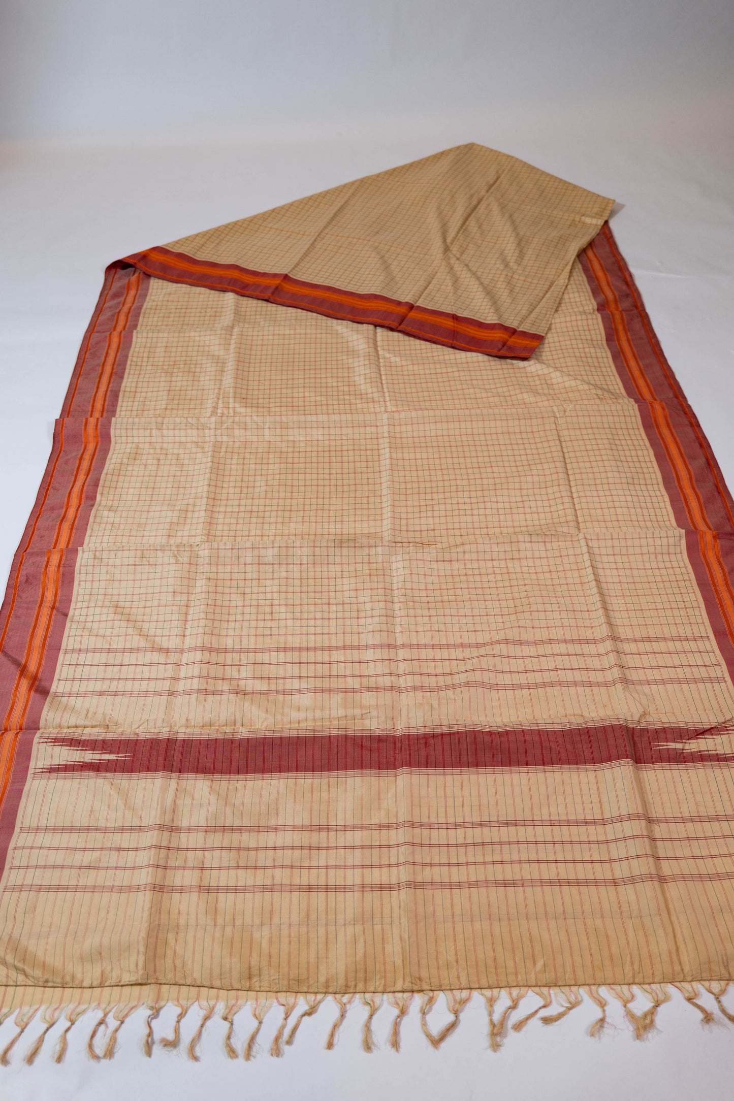 Kaamini~ Arani Silk Saree in Off-White with Maroon Checks & Thazampoo Palla – A South Indian Classic
